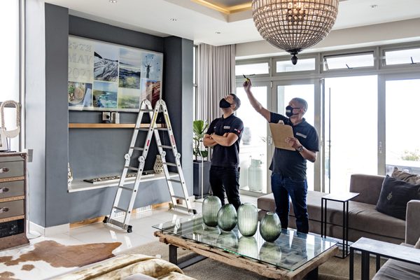 Schmidhauser team at work in a living room renovation